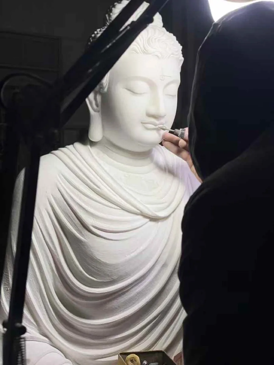 Detail work on a white marble surface